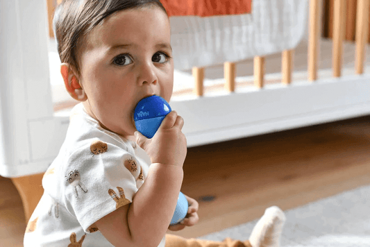 Baby Chewing on non-toxic toy