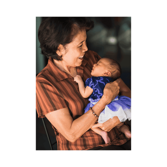 Grandma holding newborn