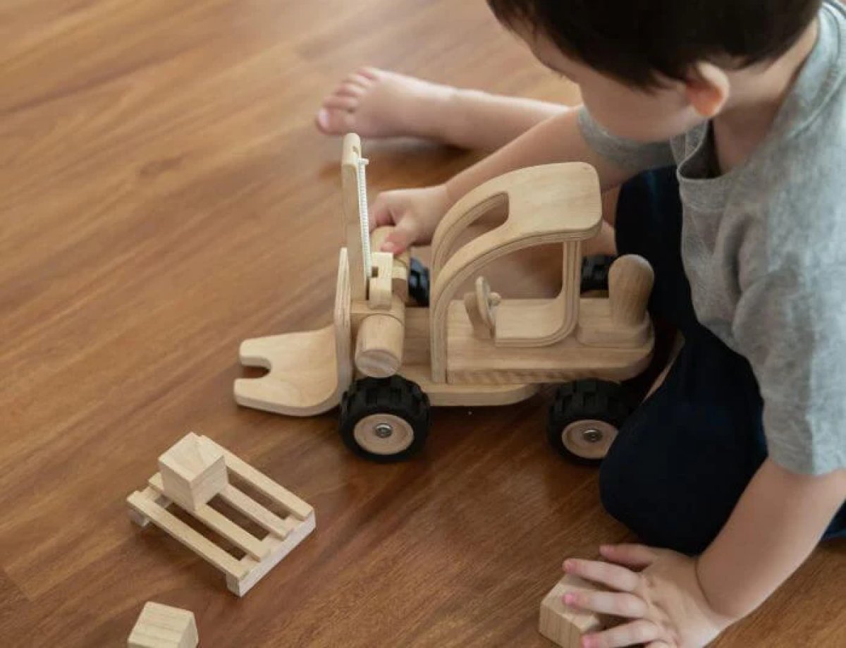 Child Playing with Blocks & Construction Toys
