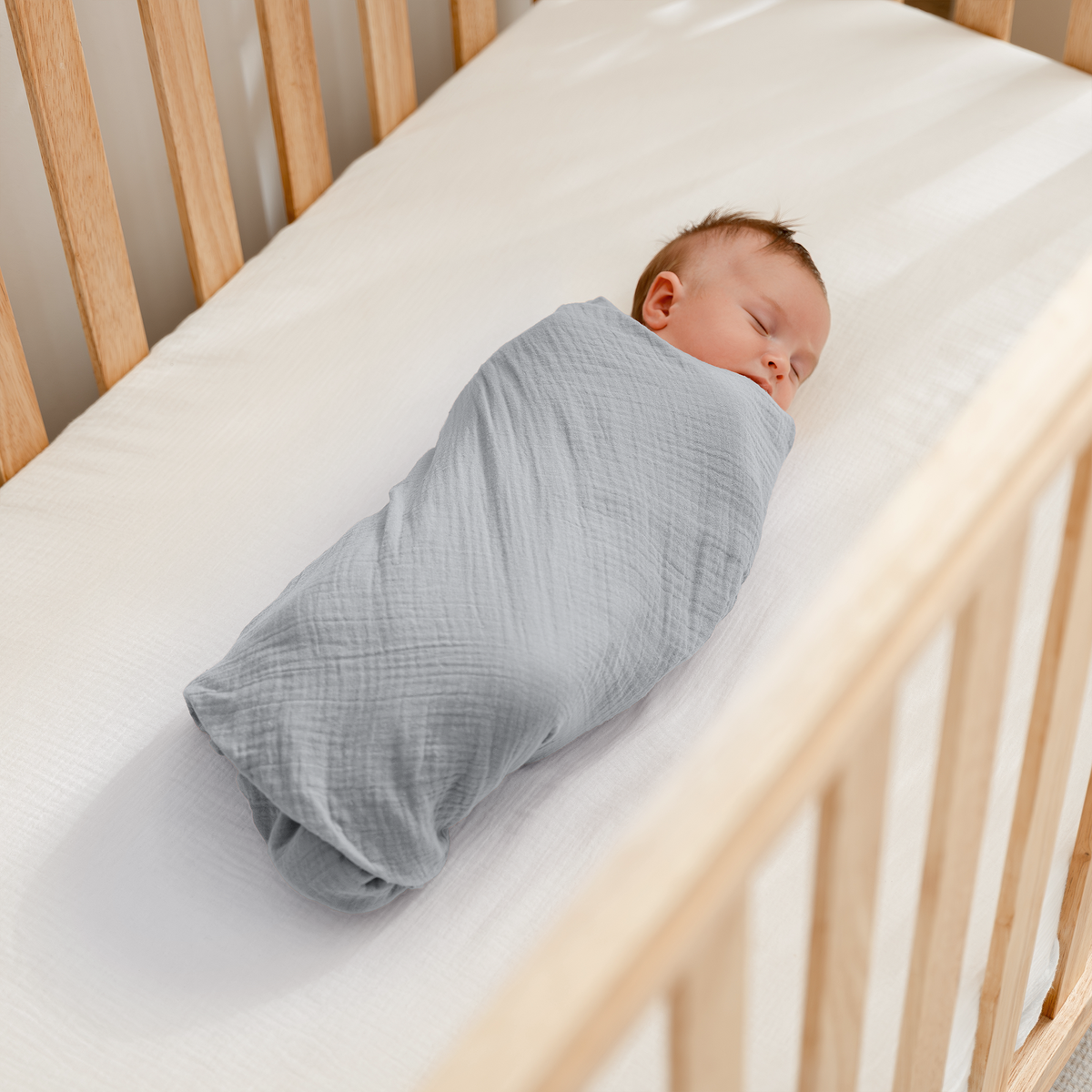 Muslin Swaddle Blankets Pack of 3, 42” x 42” in Heather Blue, Pacific Blue, Fern
