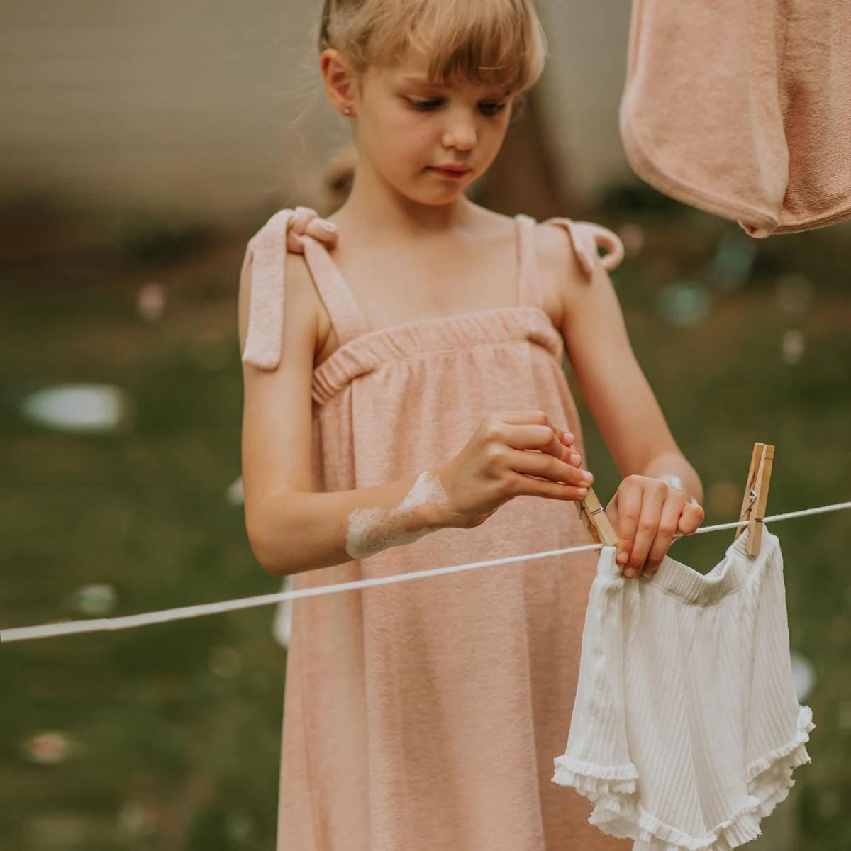 Blush Pink Terry Towel Dress with Girl outdoors